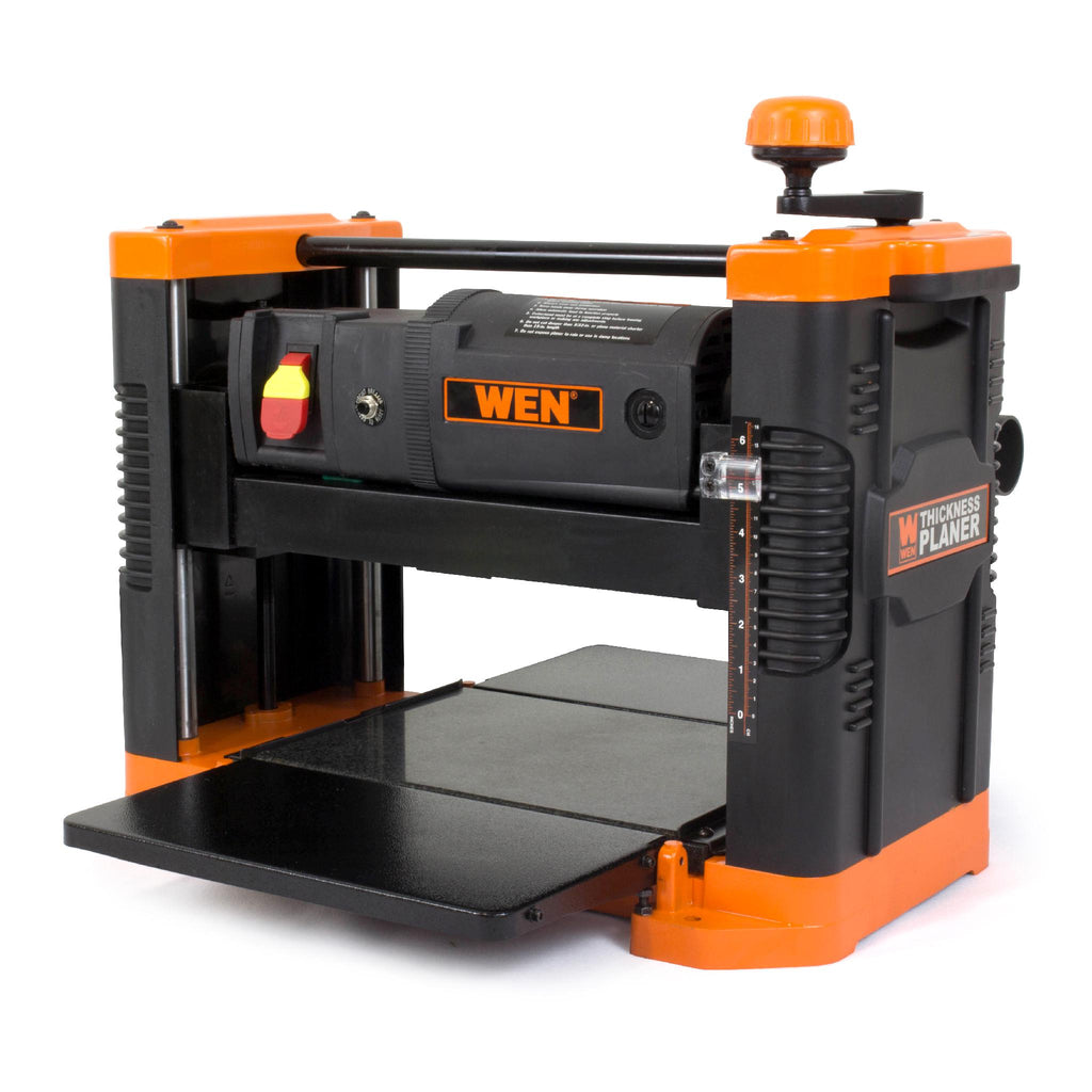 WEN 6550 12.5-inch 15-Amp Benchtop Thickness Planer hero shot, showcasing its compact design and robust construction on a workbench.